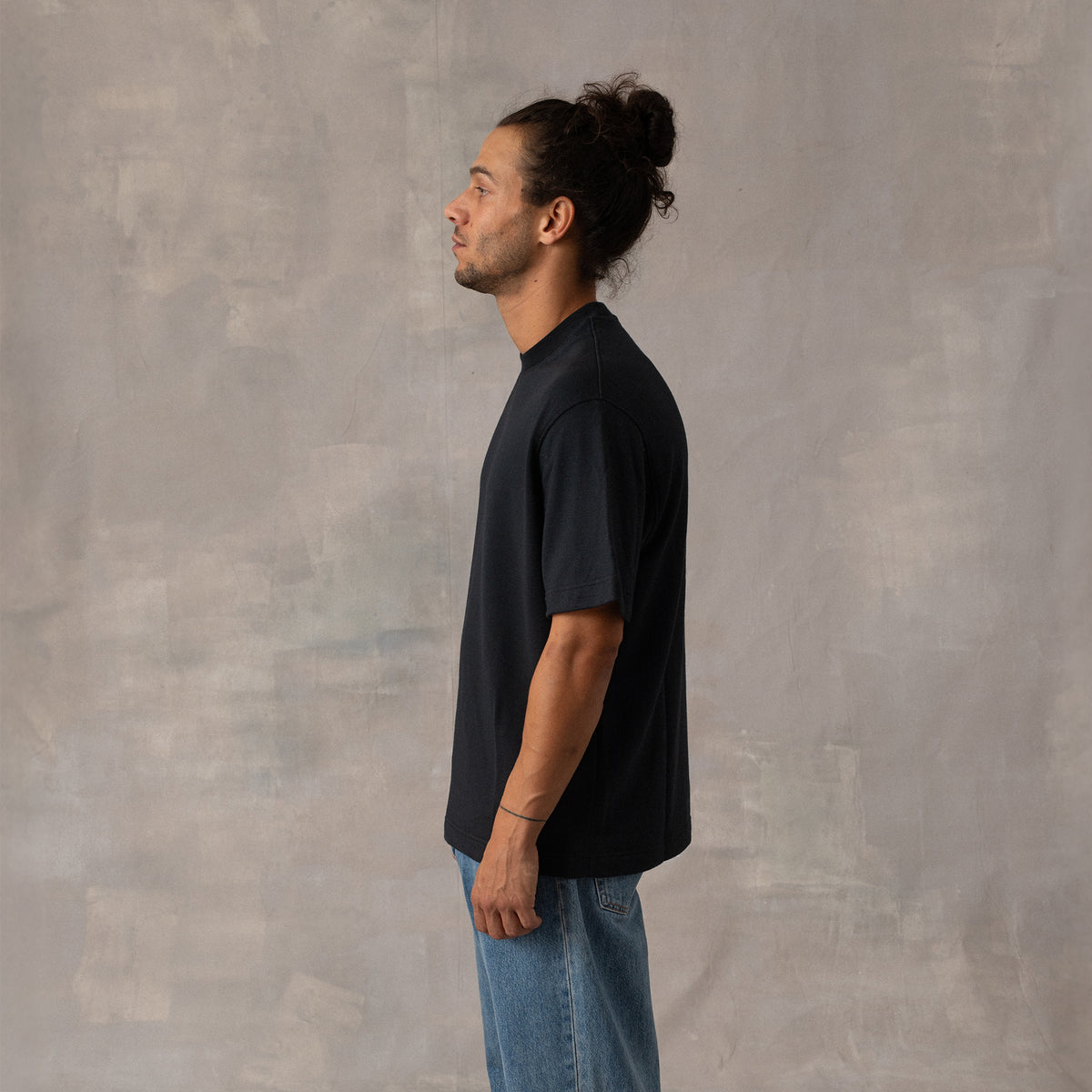 The Box Tee in black heavy merino wool, fabric detail [model: toke | size: M | length: Short]
