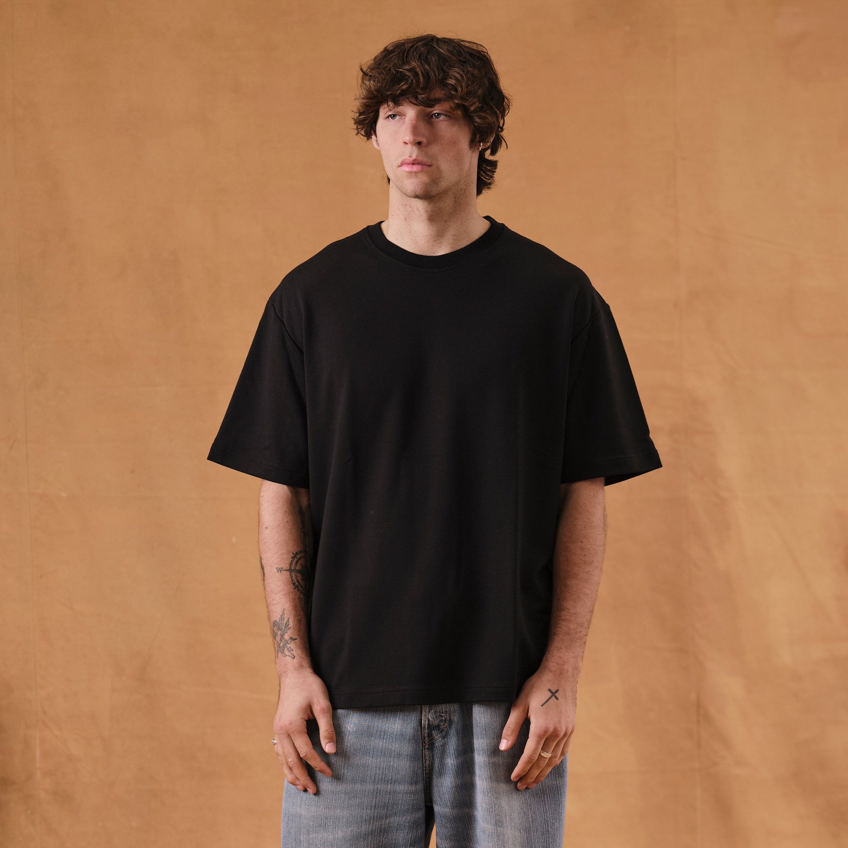 Nicholas is 195 cm tall
Weights 88 kg and wears a 
Size XL - Length Short