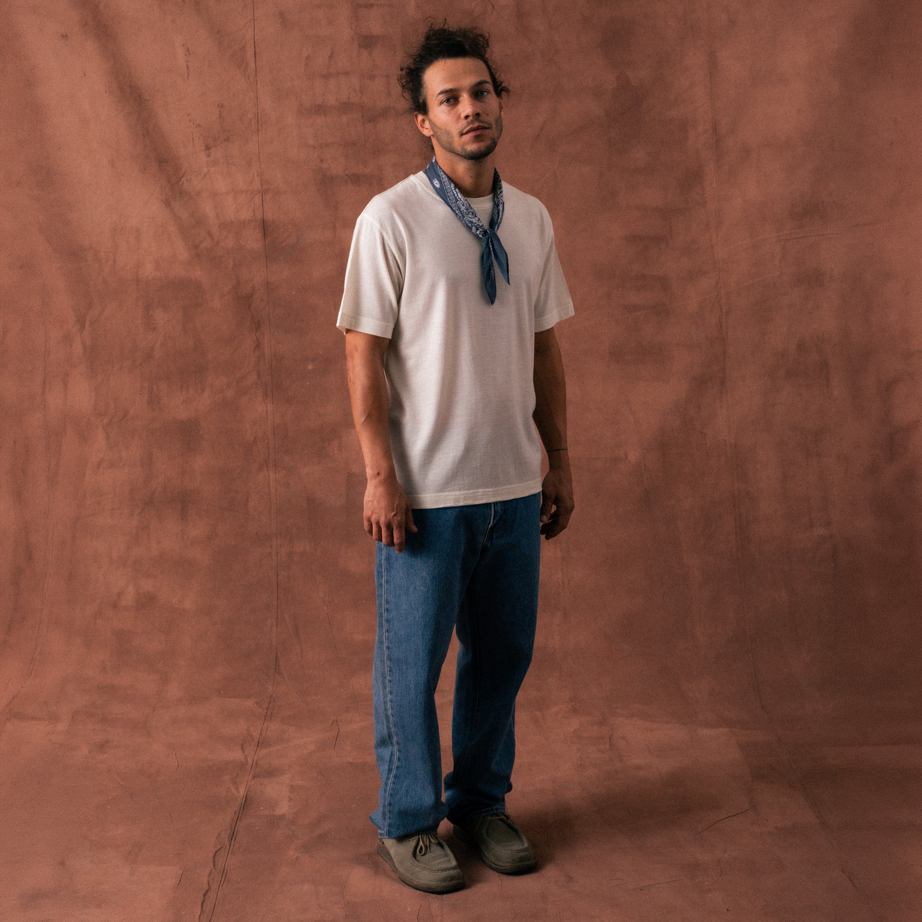 The Regular T-Shirt in undyed natural extrafine merino wool, model front view