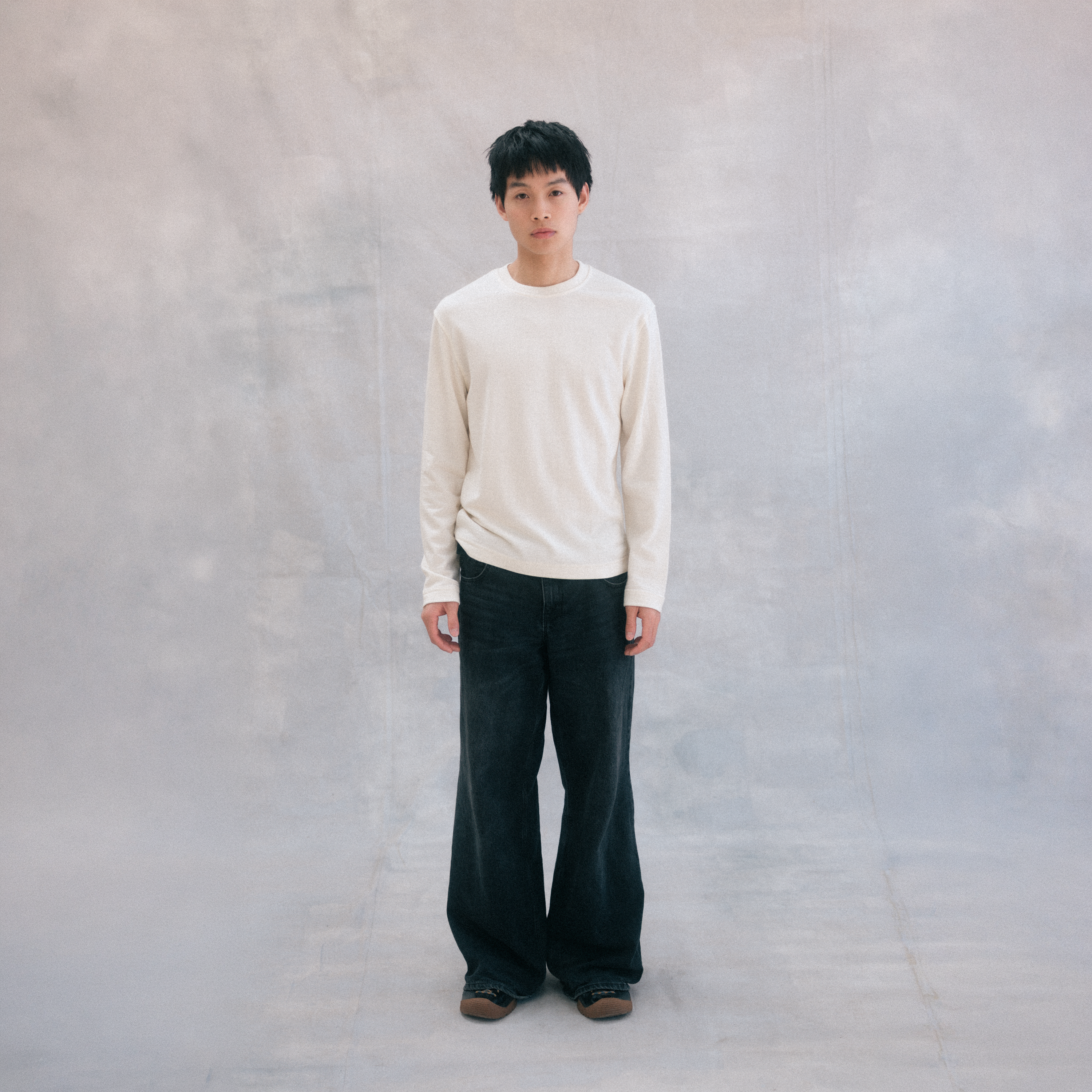 The Lightweight Sweatshirt in undyed natural heavy merino wool, side view